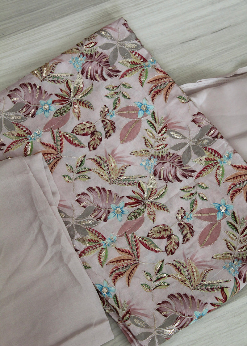 muted pink suit