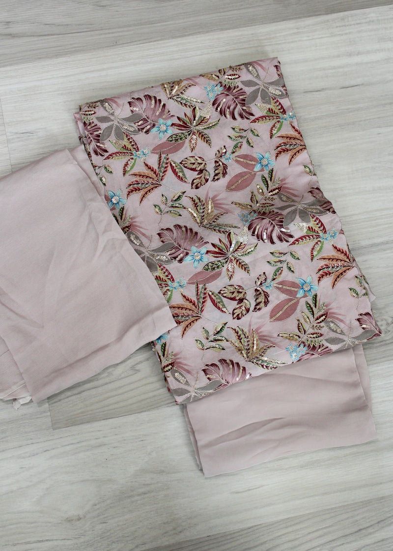 muted pink suit