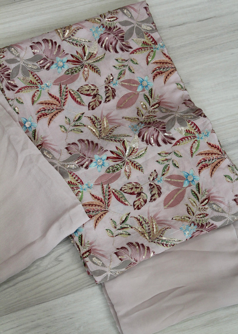 muted pink suit