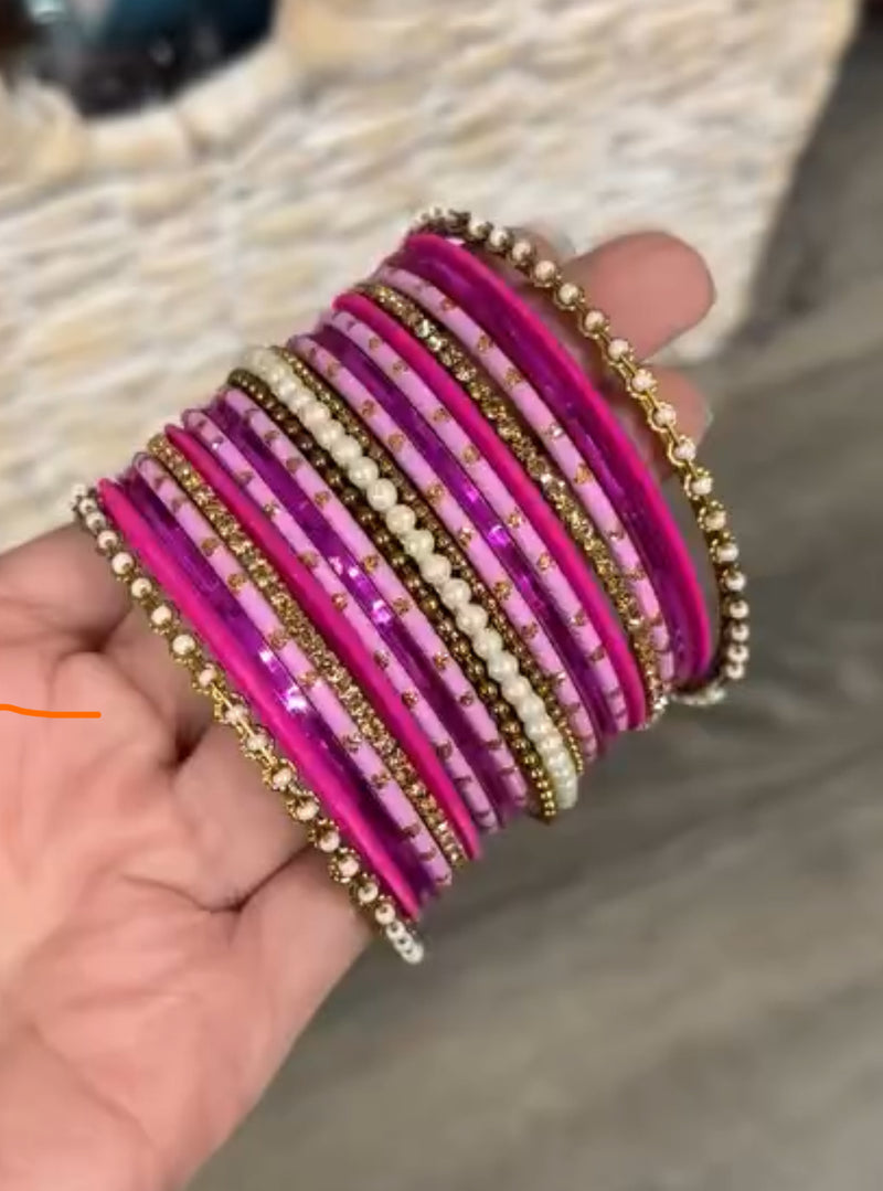 Hot pink bangles for 2 hands