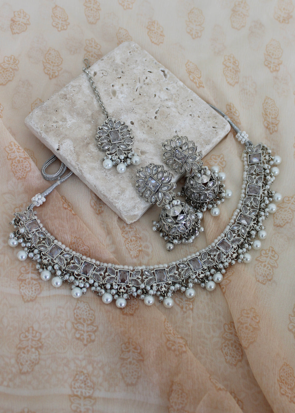 Silver with white pearls