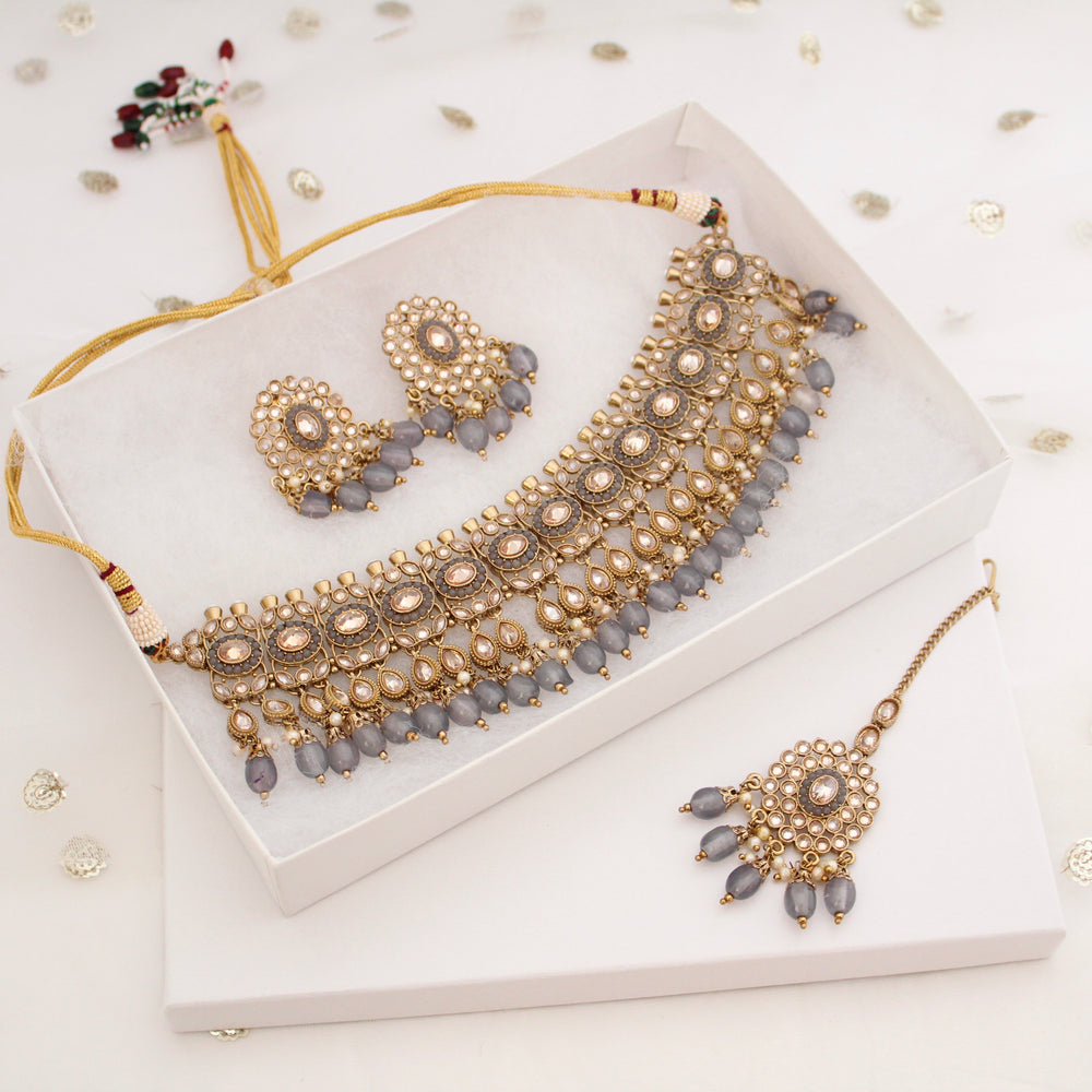 Buy Sukkhi Adorable Unique Stylish Rani Pink Stone With Pearls Choker  Necklace Set With Earring And Maangtika | Jewellery Set For Women  (NS105653) Online at Best Prices in India - JioMart.